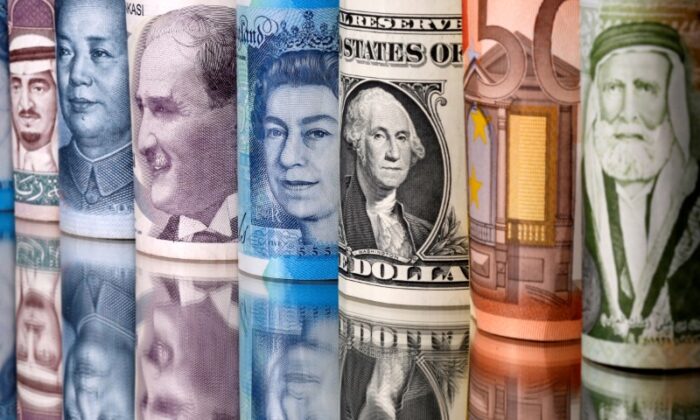 Saudi riyal, yuan, Turkish lira, pound, U.S. dollar, euro, and Jordanian dinar banknotes are seen successful  this illustration taken connected  Jan. 6, 2020. (Dado Ruvic/Reuters)