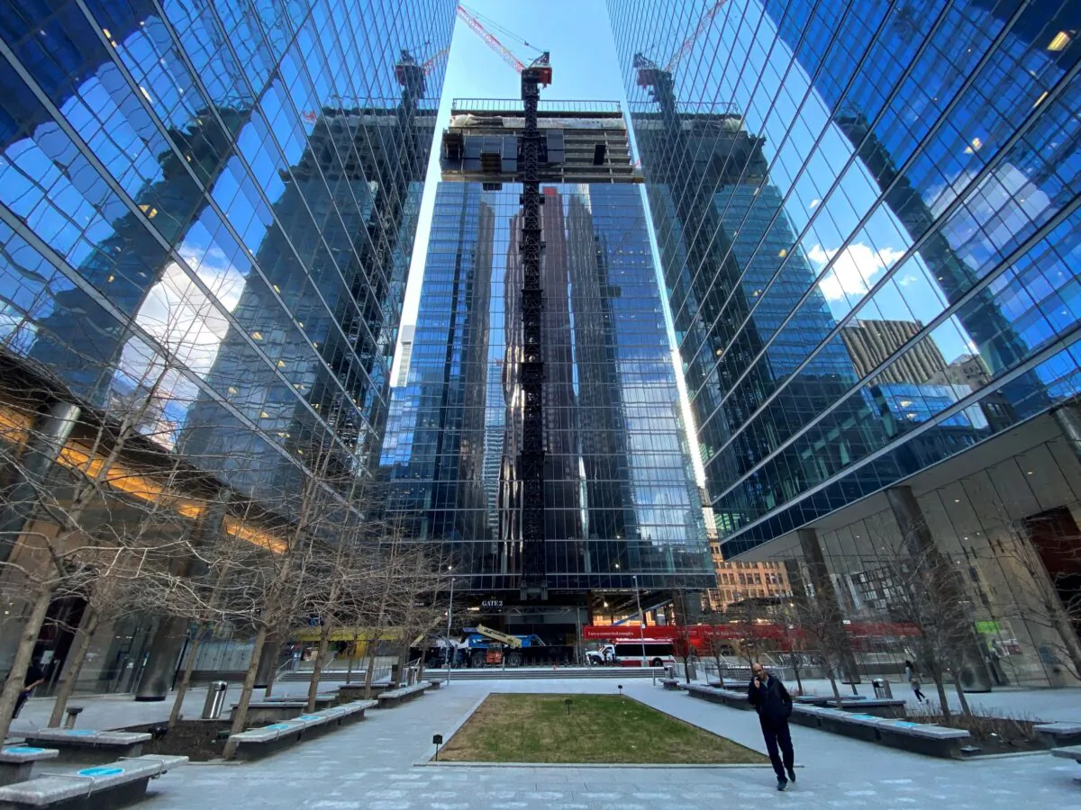A construction crane is seen above Brookfield's Bay Adelaide North, the third office tower to be constructed at their Bay Adelaide Centre complex property in Toronto, on April 14, 2021. (Chris Helgren/Reuters)