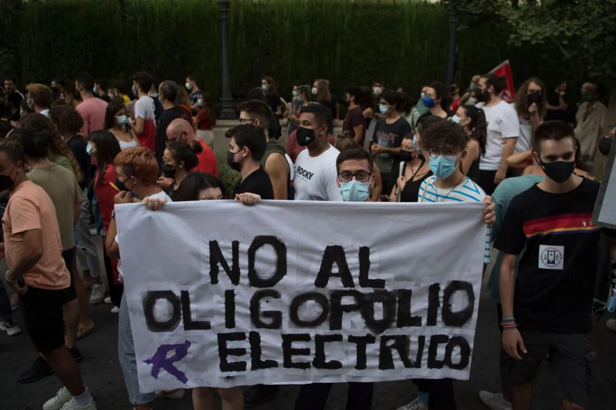People protest during a demonstration against the increase of the household electricity bills in Granada, Spain on Sept. 19, 2021. (Jorge Guerrero/AFP via Getty Images)