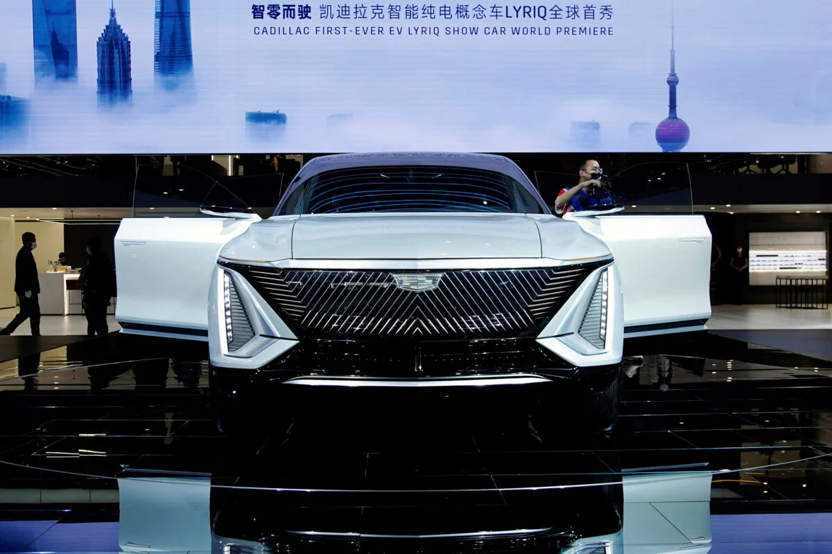 A Cadillac Lyriq electric vehicle (EV) under General Motors is seen during its world premiere on a media day for the Auto Shanghai show in Shanghai, China on April 19, 2021. (Aly Song/Reuters)