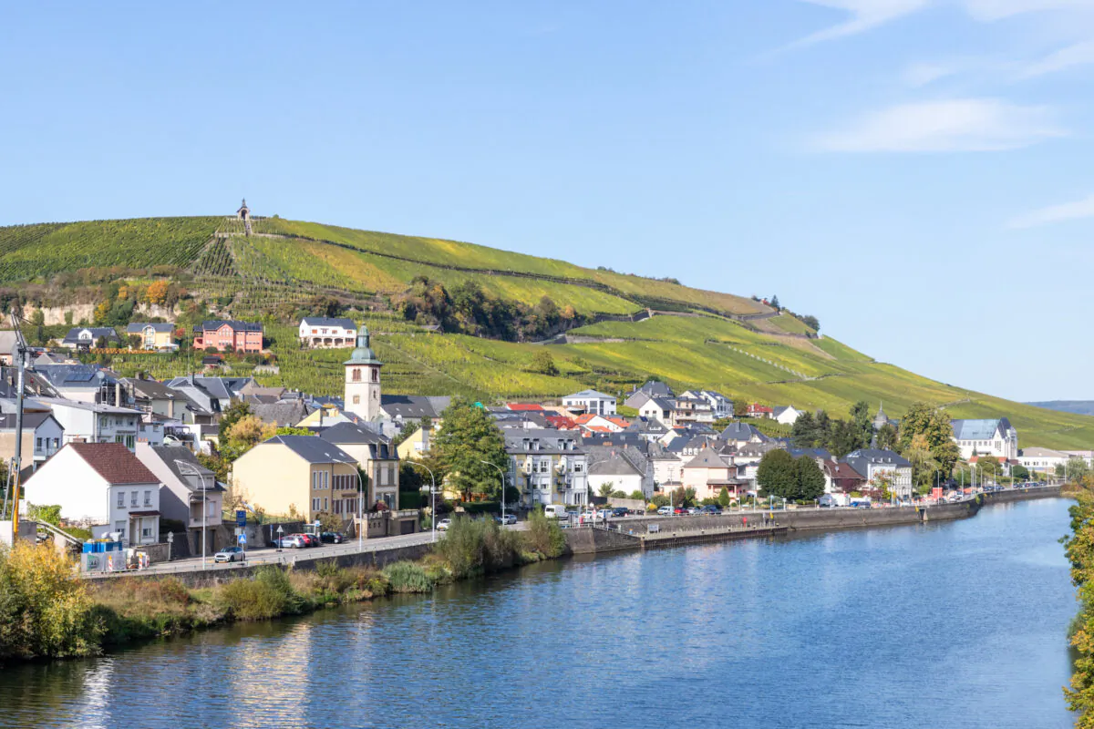 The Moselle River in southeastern Luxembourg is the border with Germany. The vineyards of Luxembourg's wine industry occupy the steep slopes of the left bank. (Dennis Lennox)