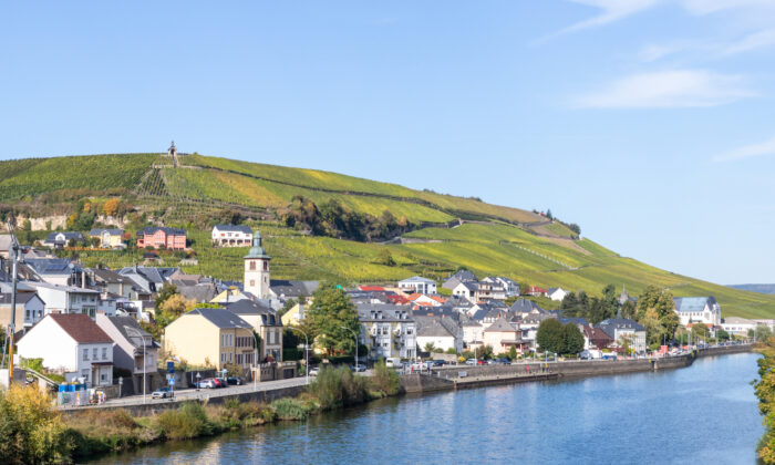  Moselle River in southeastern Luxembourg is the border with Germany.  vineyards of Luxembourg's wine industry occupy the steep slopes of the left bank. (Dennis Lennox)