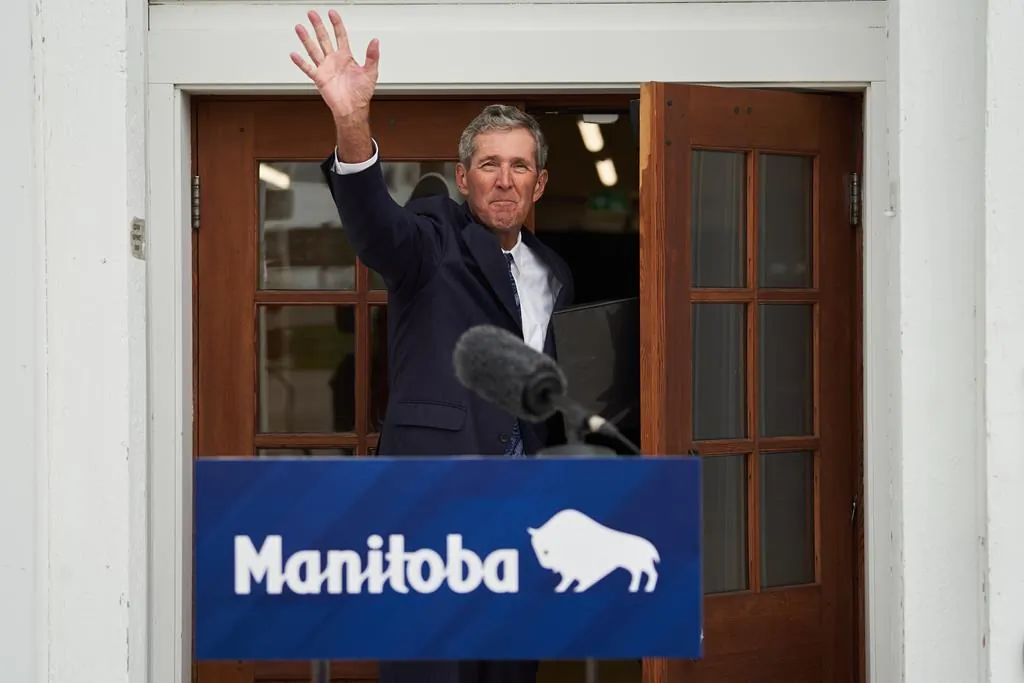 Manitoba Premier Brian Pallister announces that he will not be seeking re-election in front of the Dome Building in Brandon, Man., on Aug. 10, 2021. (The Canadian Press/David Lipnowski)