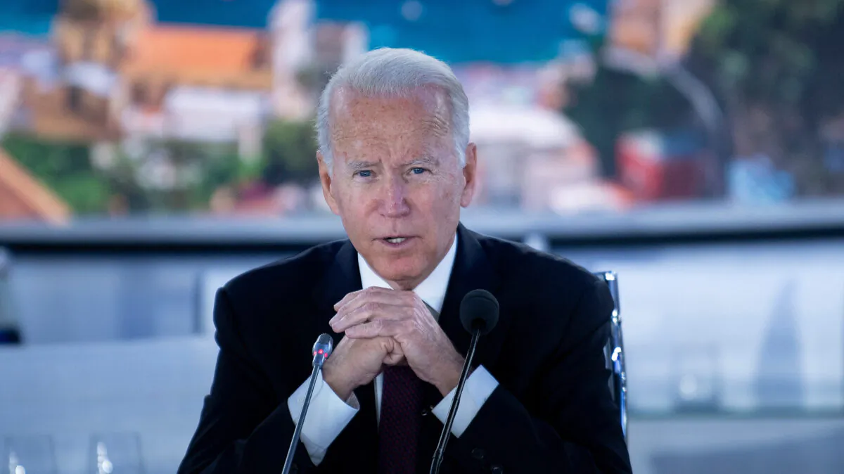 President Joe Biden speaks at the beginning of a meeting about the global supply chain, during the G-20 Summit at the Roma Convention Center La Nuvola in Rome, Italy, on Oct. 31, 2021. (Brendan Smialowski/AFP via Getty Images)