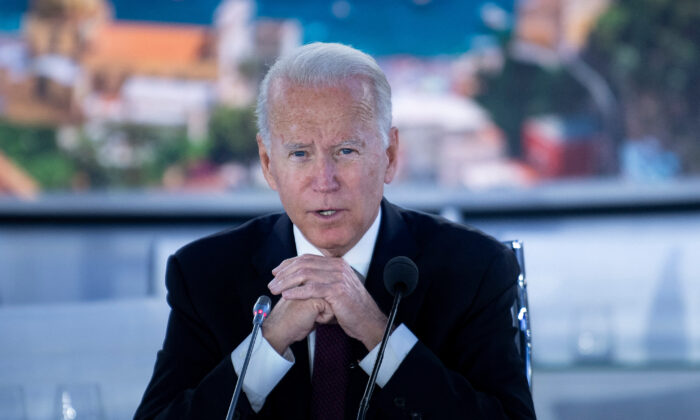 President Joe Biden speaks at the beginning of a meeting about the global supply chain, during the G-20 Summit at the Roma Convention Center La Nuvola in Rome, Italy, on Oct. 31, 2021. (Brendan Smialowski/AFP via Getty Images)