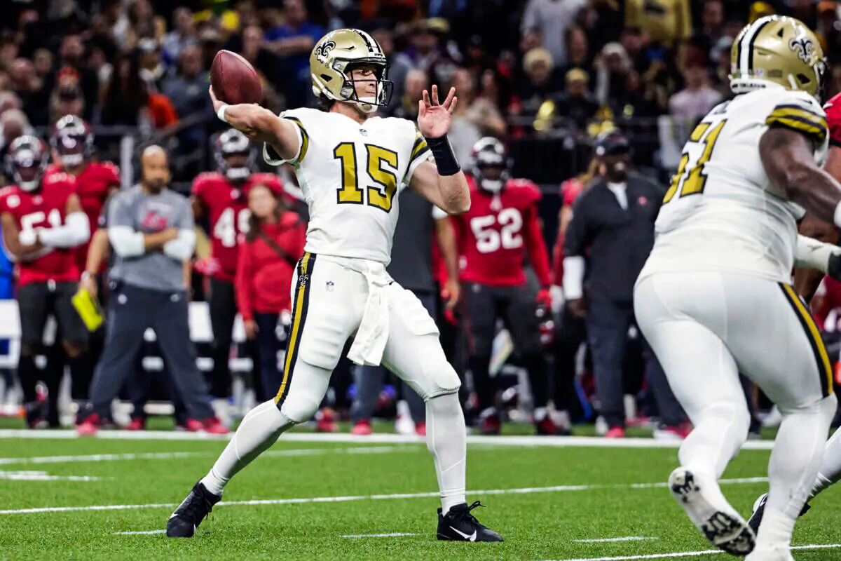 New Orleans Saints quarterback Trevor Siemian (15) passes in the first half of an NFL football game against the Tampa Bay Buccaneers in New Orleans on Oct. 31, 2021. (Derick Hingle/AP Photo)