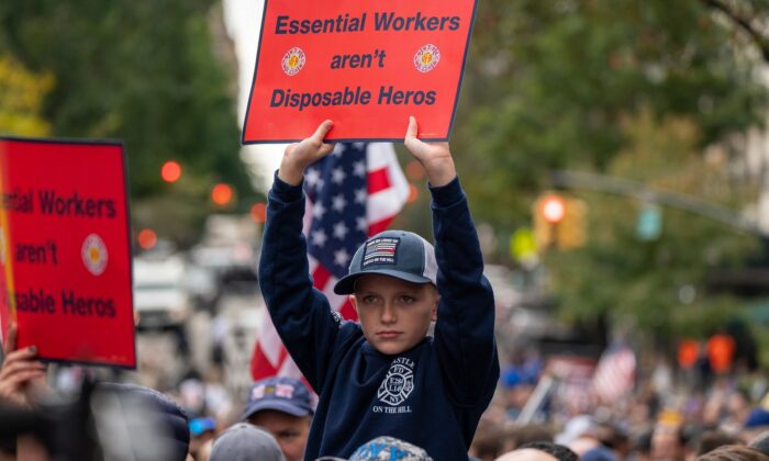 People protest the COVID-19 vaccine mandate for municipal workers during a protest at Gracie Mansion in New York City on Oct. 28, 2021. (David Dee Delgado/Getty Images)