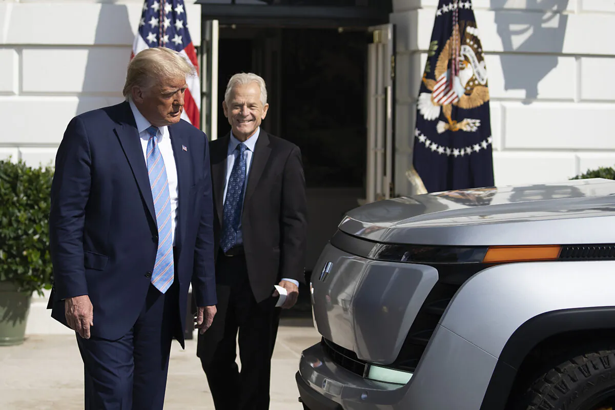 President Donald Trump and White House Trade Adviser Peter Navarro check out the new Endurance all-electric pickup truck on the south lawn of the White House on Sept. 28, 2020. (Tasos Katopodis/Getty Images)
