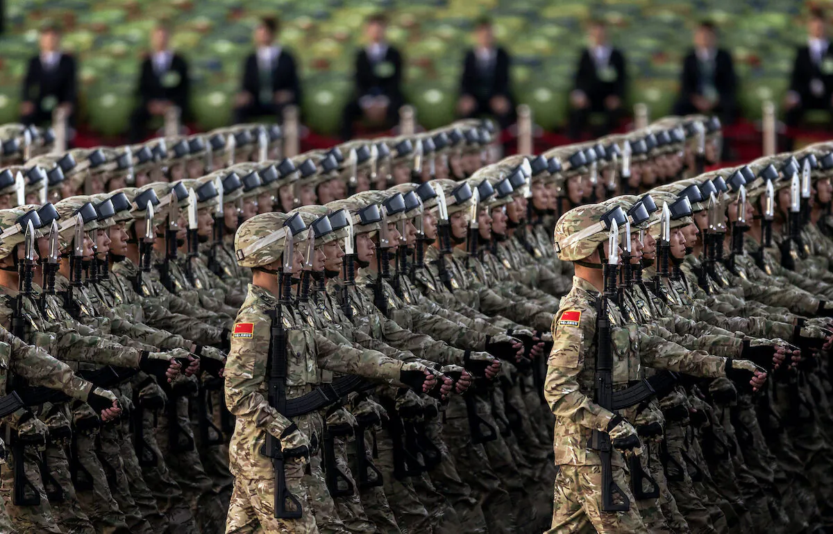 Chinese soldiers march past Tiananmen Square before a military parade in Beijing, China, on Sept. 3, 2015. (Kevin Frayer/Getty Images)