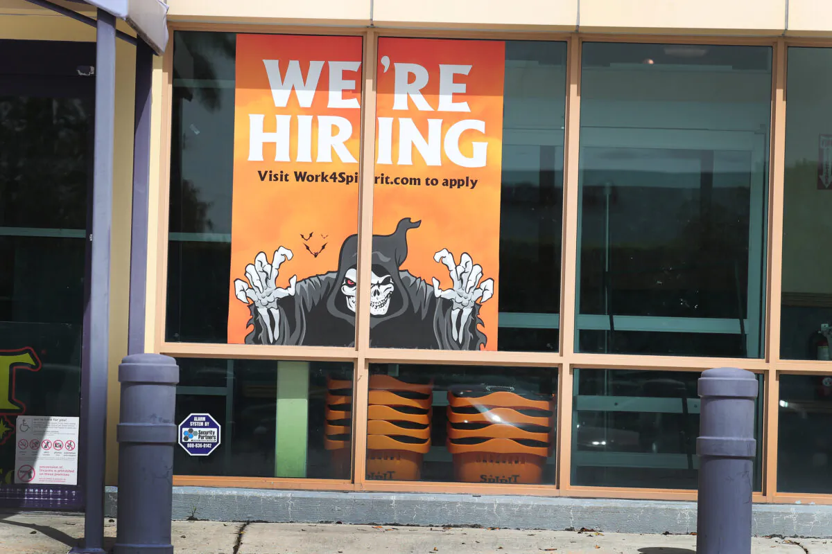 A "We're Hiring" sign is seen in a store window on Sep. 4, 2020, in Miami, Florida. (Joe Raedle/Getty Images)