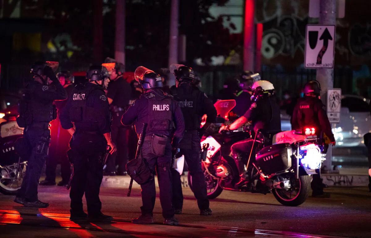 Los Angeles Police Department officers respond to civil unrest in downtown Los Angeles on Nov. 6, 2020. (John Fredricks/The Epoch Times)