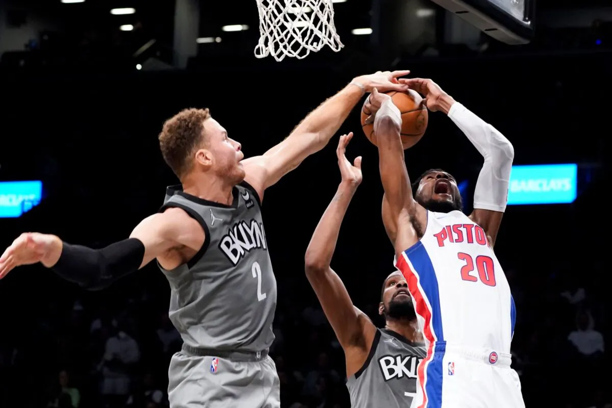 Brooklyn Nets forward Blake Griffin (2) fouls Detroit Pistons guard Josh Jackson (20) during the first half of an NBA basketball game in New York on Oct. 31, 2021. (Corey Sipkin/AP Photo)