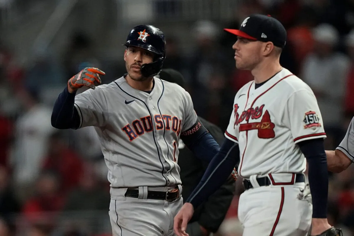 Houston Astros' Carlos Correa celebrates his RBI single during the eighth inning in Game 5 of baseball's World Series between the Houston Astros and the Atlanta Braves in Atlanta on Oct. 31, 2021. (David J. Phillip/AP Photo)