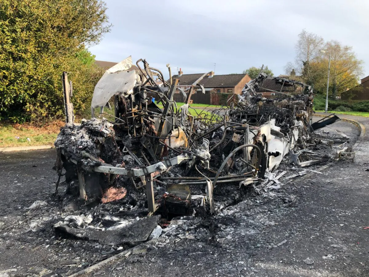 The remains of a bus that was hijacked and set alight in Newtownards, Northern Ireland on Nov. 1, 2021.(David Young/PA)