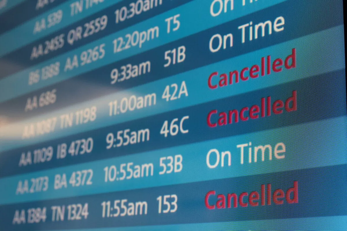 A screen showing cancelled flights at Los Angeles International Airport in Los Angeles on Oct. 31, 2021. (Carlos Barria/Reuters)