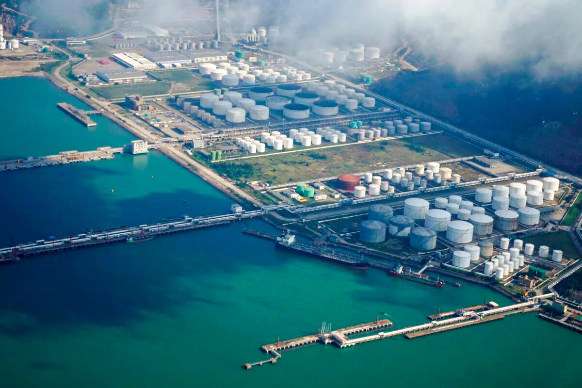 Oil and gas tanks are seen at an oil warehouse at a port in Zhuhai, China, on Oct. 22, 2018. (Aly Song/Reuters)
