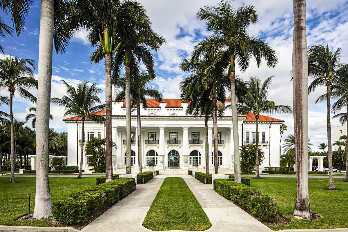 Whitehall’s main façade, facing the rising sun, is defined by six massive Doric columns that were typical of temples of Apollo. The design emulated a temple where the Muses of arts and literature reside. (Flagler Museum)