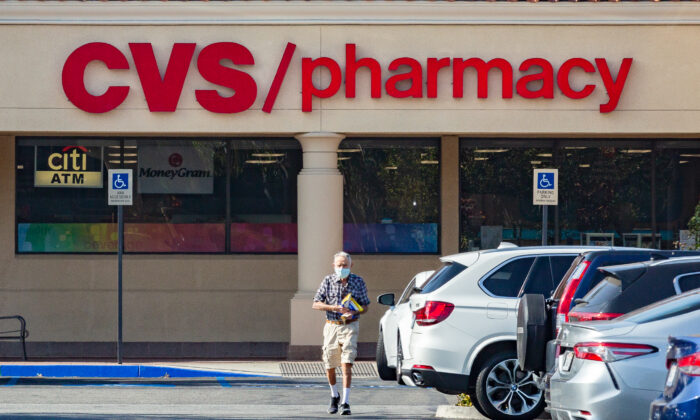 An elderly customer leaves a CVS Pharmacy in Irvine, California, on Feb. 11, 2021. (John Fredricks/  Pezou)