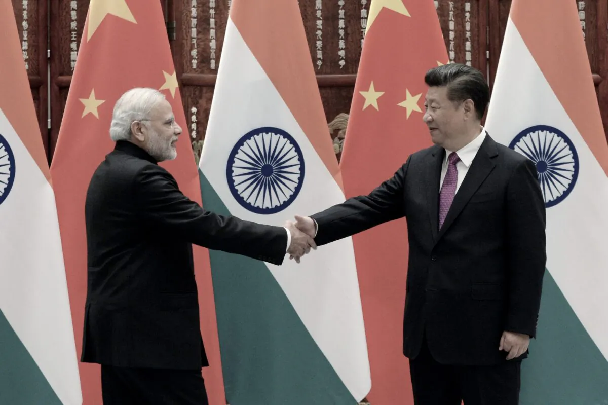 Indian Prime Minister Narendra Modi (L) shakes hands with Chinese communist party leader Xi Jinping (R) in Hangzhou, China, on Sept. 4, 2016. (Wang Zhou - Pool/Getty Images)