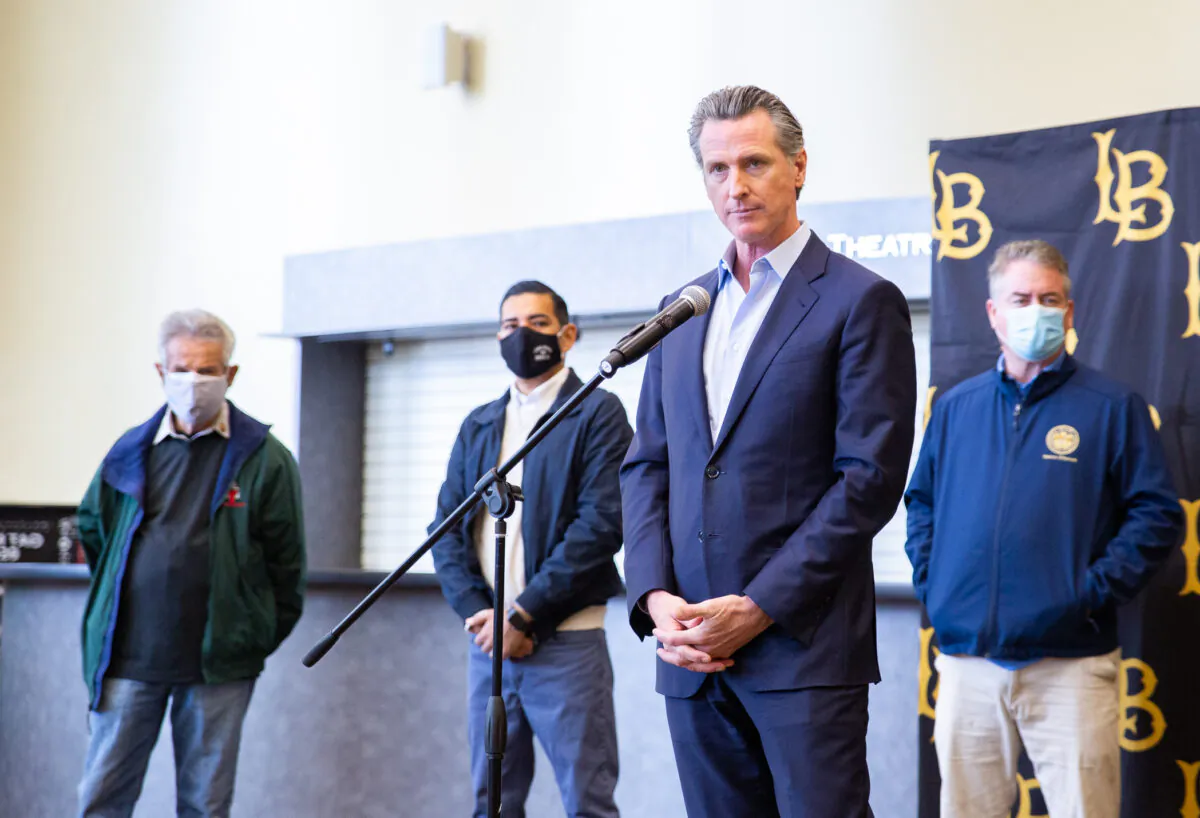 California Gov. Gavin Newsom attends the opening of the country's first federal and state operated community vaccination site during the outbreak of the coronavirus disease (COVID-19) in Los Angeles on Feb. 16, 2021. (Mike Blake/Reuters)