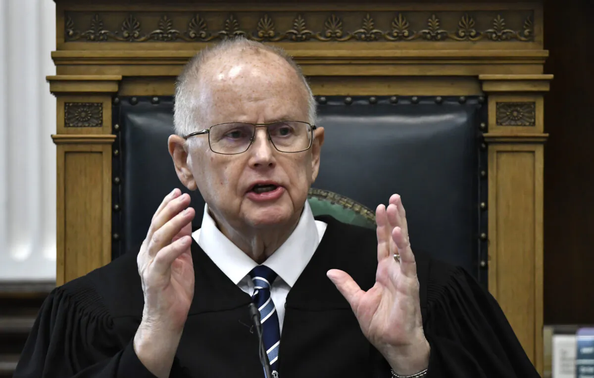 Circuit Court Judge Bruce Schroeder addresses the jury pool at the start of jury selection on the first day of trial for Kyle Rittenhouse in Kenosha, Wis., on Nov. 1, 2021. (Sean Krajacic/The Kenosha News via AP)