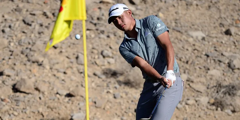 Collin Morikawa chips on the second fringe during the first round of the CJ Cup golf tournament in Las Vegas, on Oct. 14, 2021. (Joe Camporeale/USA Today Sports via Field Level Media)