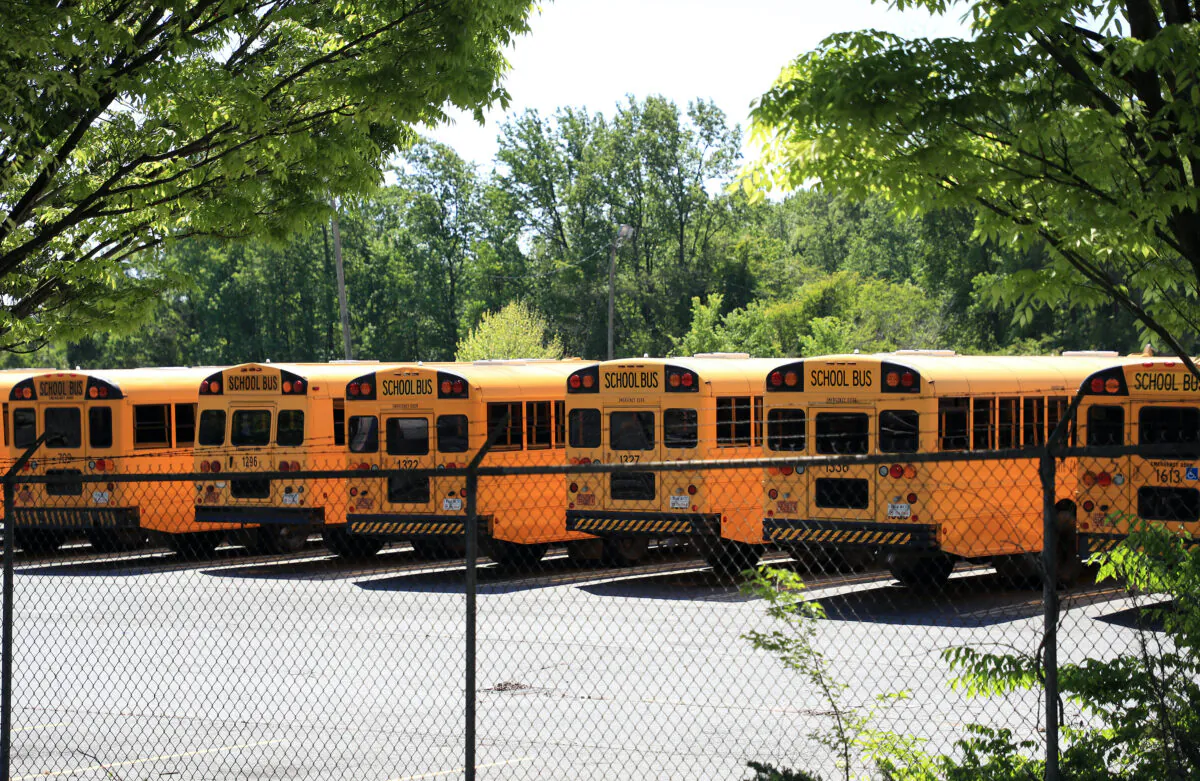 Parked school busses sit in a lot during the coronavirus (COVID-19) pandemic on April 21, 2020 in Charlotte, North Carolina. Charlotte. (Streeter Lecka/Getty Images)