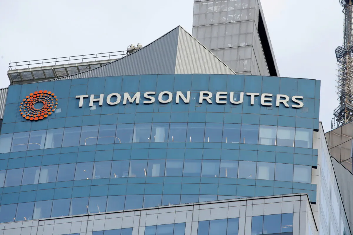 The Thomson Reuters logo is seen on the company building in Times Square, New York, on Jan. 30, 2018. (Andrew Kelly/Reuters)