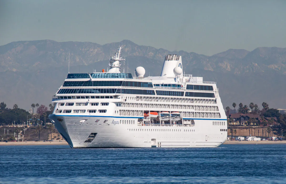 In this file photo, a cruise ship sits anchored in the Port of Long beach, Calif., on Oct. 27, 2021. (John Fredricks/The Epoch Times)