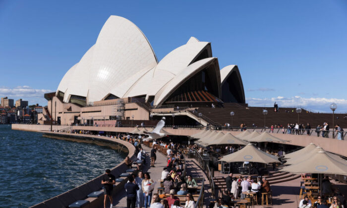 People gather at the Opera Bar as hospitality reopens in Sydney, Australia, on Oct. 16, 2021. (Brook Mitchell/Getty Images)