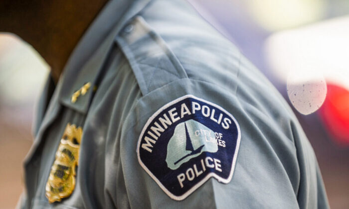 Minneapolis police insignia on uniform in a file photo. (Stephen Maturen/Getty Images)