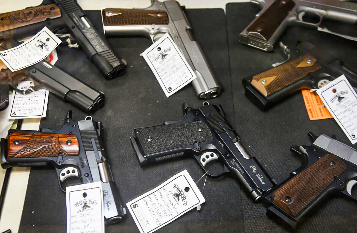 Pistols are offered for sale at Freddie Bear Sports in Tinley Park, Ill. on Oct. 18, 2012. (Scott Olson/Getty Images)