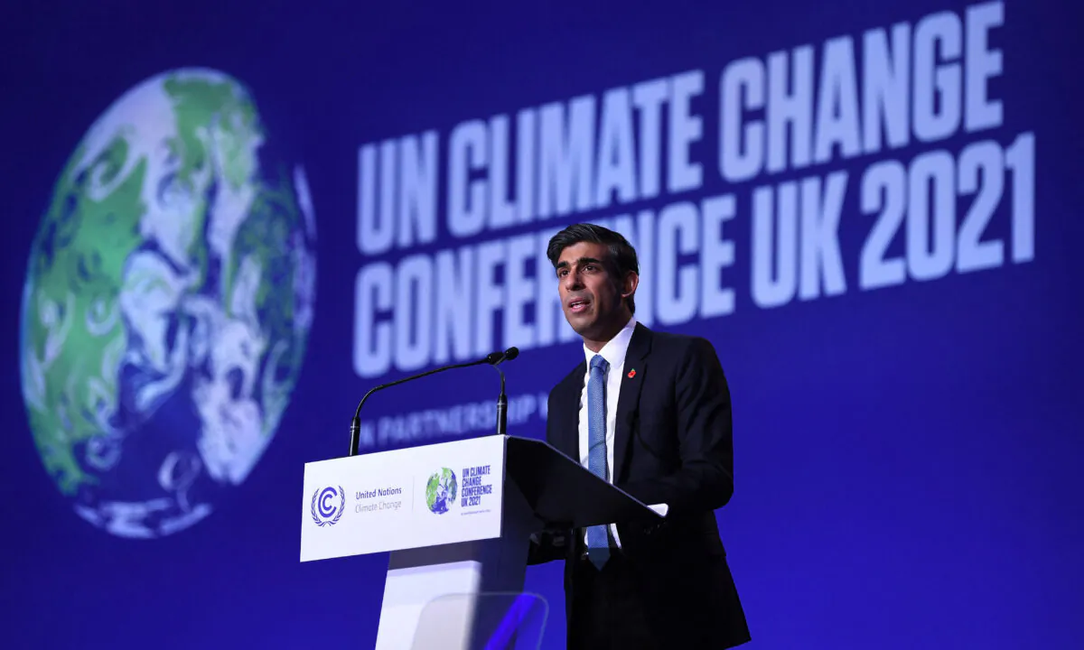 The UK's Chancellor of the Exchequer Rishi Sunak delivers a speech at the opening of Finance Day at the COP26 U.N. Climate Summit in Glasgow, Scotland, on Nov. 3, 2021. (Daniel Leal-Olivas /AFP via Getty Images)