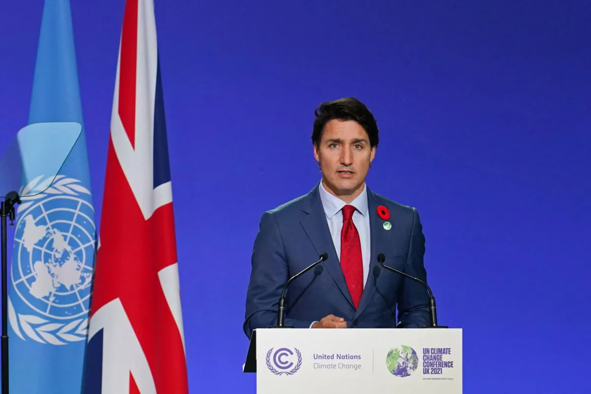 Canada’s Prime Minister Justin Trudeau presents his national statement as part of the World Leaders Summit of the COP26 UN Climate Change Conference in Glasgow, Scotland, on Nov. 1, 2021. (Ian Forsyth/POOL/AFP via Getty Images)