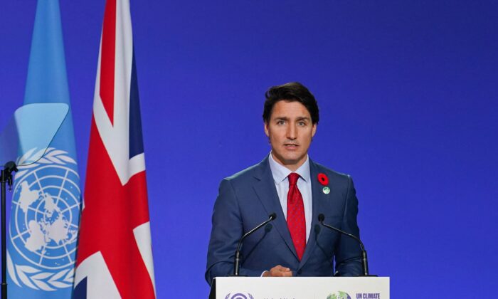 Canada’s Prime Minister Justin Trudeau presents his national statement as part of the World Leaders Summit of the COP26 UN Climate Change Conference in Glasgow, Scotland, on Nov. 1, 2021. (Ian Forsyth/POOL/AFP via Getty Images)