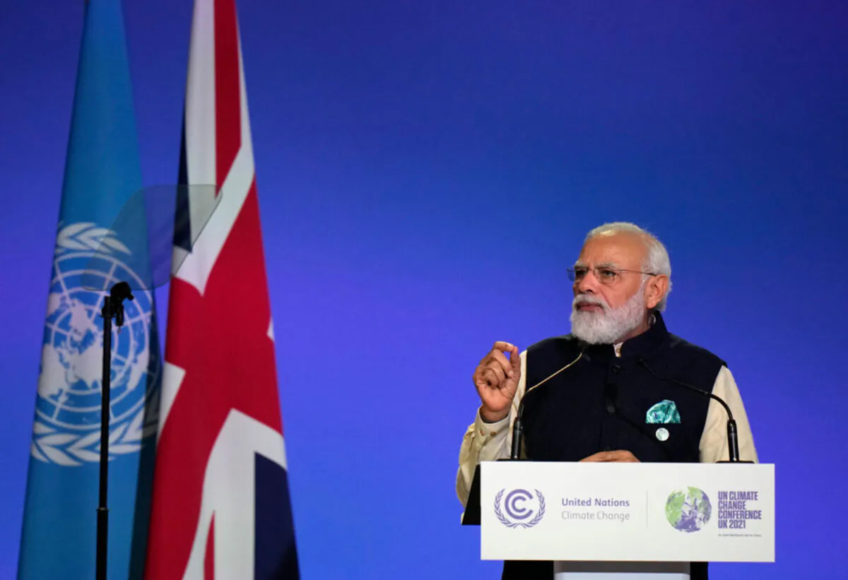 Indian Prime Minister Narendra Modi presents his national statement on day two of COP26 at SECC in Glasgow, United Kingdom, on Nov. 1, 2021. (Alastair Grant/Pool/Getty Images/TNS)