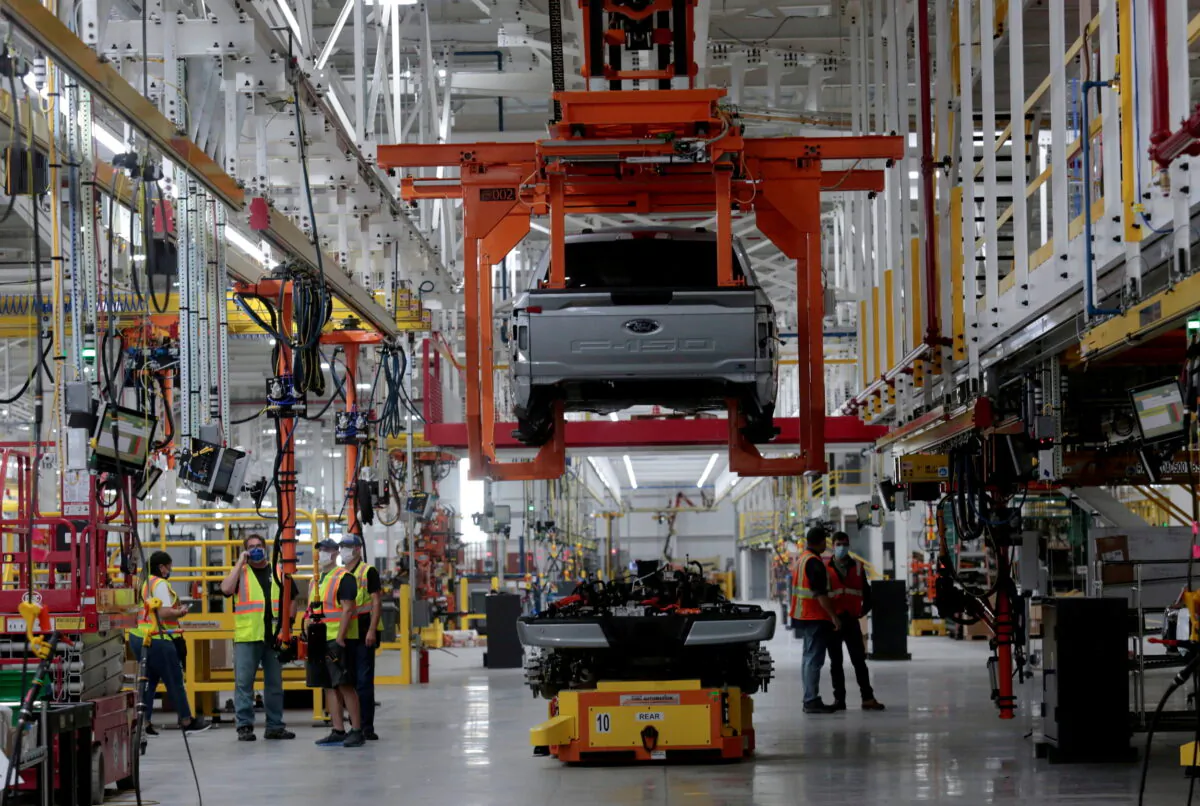 The body and chassis of a Ford pre-production all-electric F-150 Lightning truck prototype at the Rouge Electric Vehicle Center in Dearborn, Mich., on Sept. 16, 2021. (Rebecca Cook/Reuters)