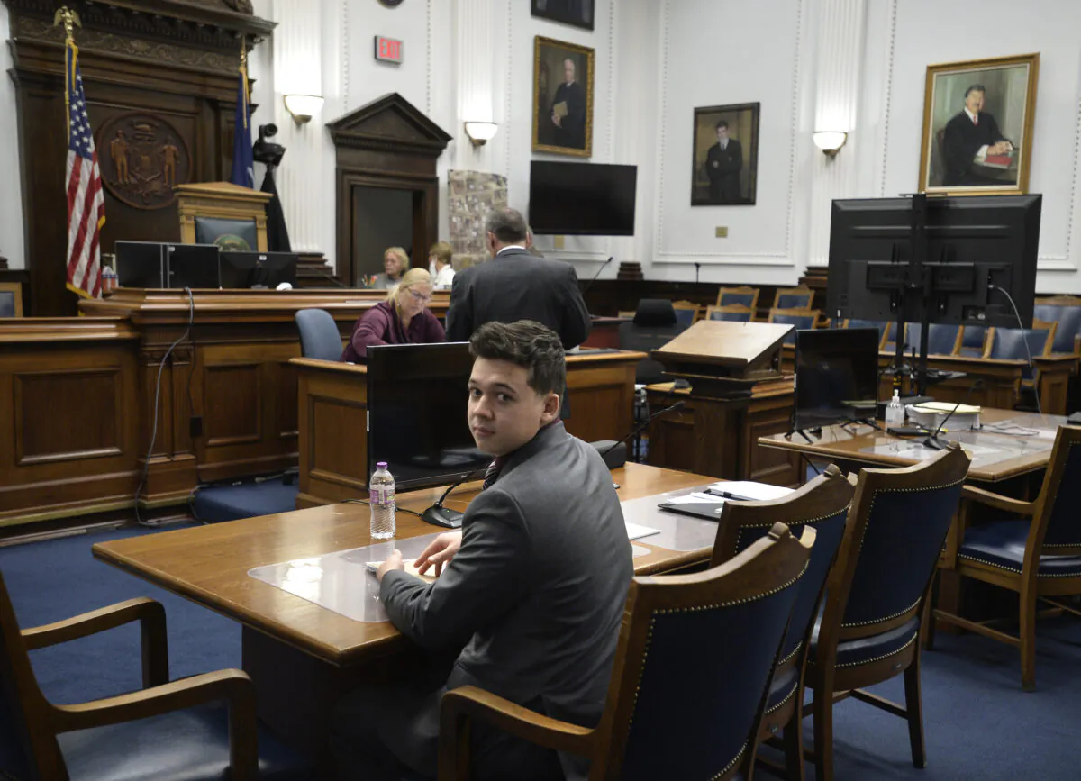 Kyle Rittenhouse waits for his legal team before the trail at the Kenosha County Courthouse in Kenosha, Wis., on Nov. 4, 2021. (Sean Krajacic/The Kenosha News via AP)