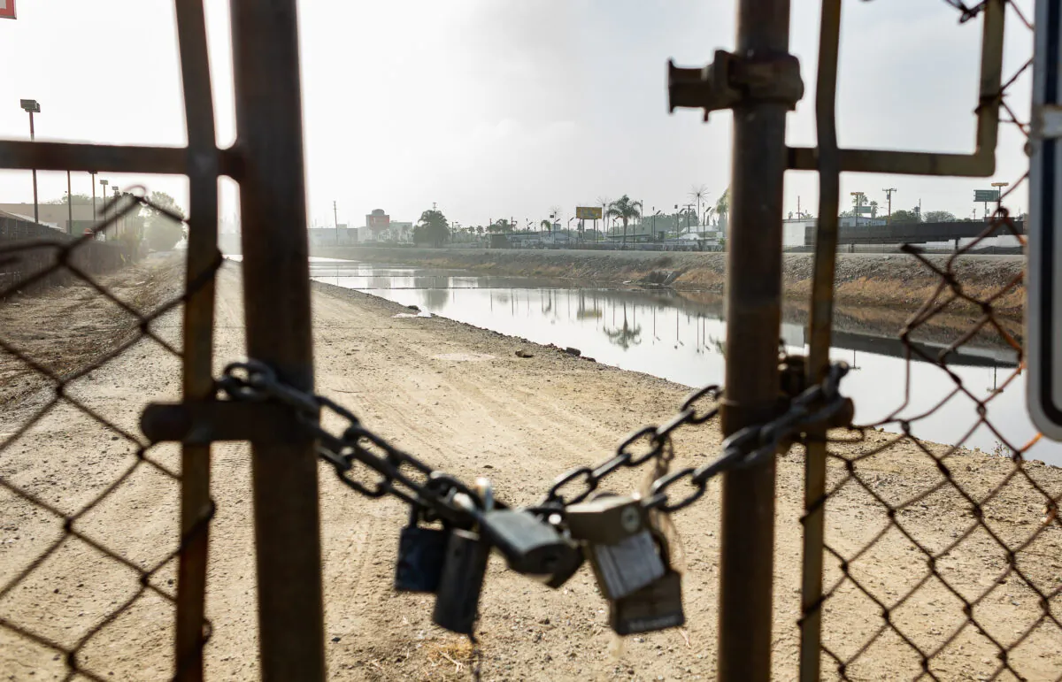 Businesses and residents near The Dominguez Channel have been experiencing a foul odor from the water in Carson, Calif., on Nov. 4, 2021. (John Fredricks/The Epoch Times)