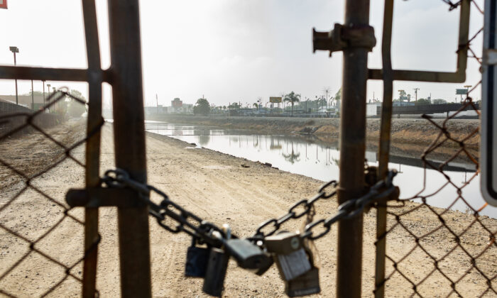 Businesses and residents near The Dominguez Channel have been experiencing a foul odor from the water in Carson, Calif., on Nov. 4, 2021. (John Fredricks/The Epoch Times)