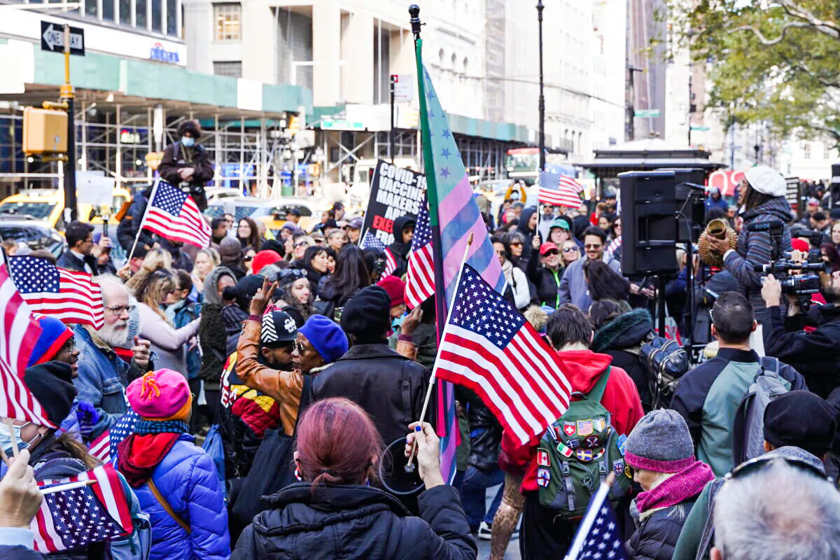 Protesters against vaccine mandate gather outside City Hall on Nov 3, 2021. (Enrico Trigoso/The Epoch Times)