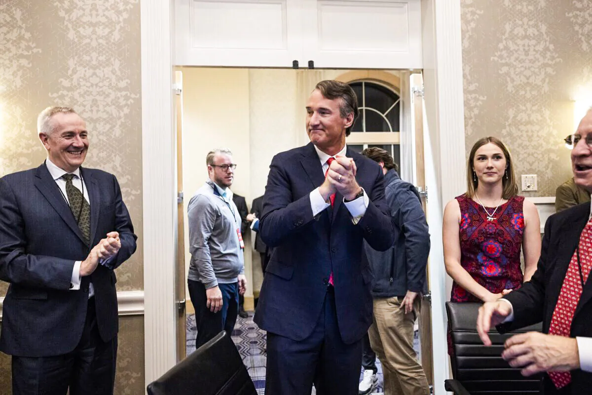 CHANTILLY, VIRGINIA - NOVEMBER 02: Republican gubernatorial candidate Glenn Youngkin claps after learning that polling numbers indicated that he was ahead in the Virginia Gubernatorial race Westfields Marriott Washington Dulles on November 02, 2021 in Chantilly, Virginia. Virginians went to the polls Tuesday to vote in the gubernatorial race that pits Youngkin against Democratic gubernatorial candidate, former Virginia Gov. Terry McAuliffe. (Photo by Anna Moneymaker/Getty Images)
