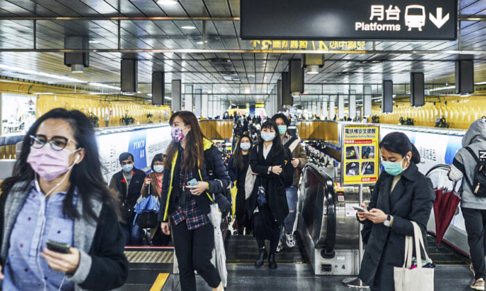 Commuters wear masks at a railway station in Taipei, Taiwan, on Dec. 2, 2020. (An Rong Xu/Getty Images)