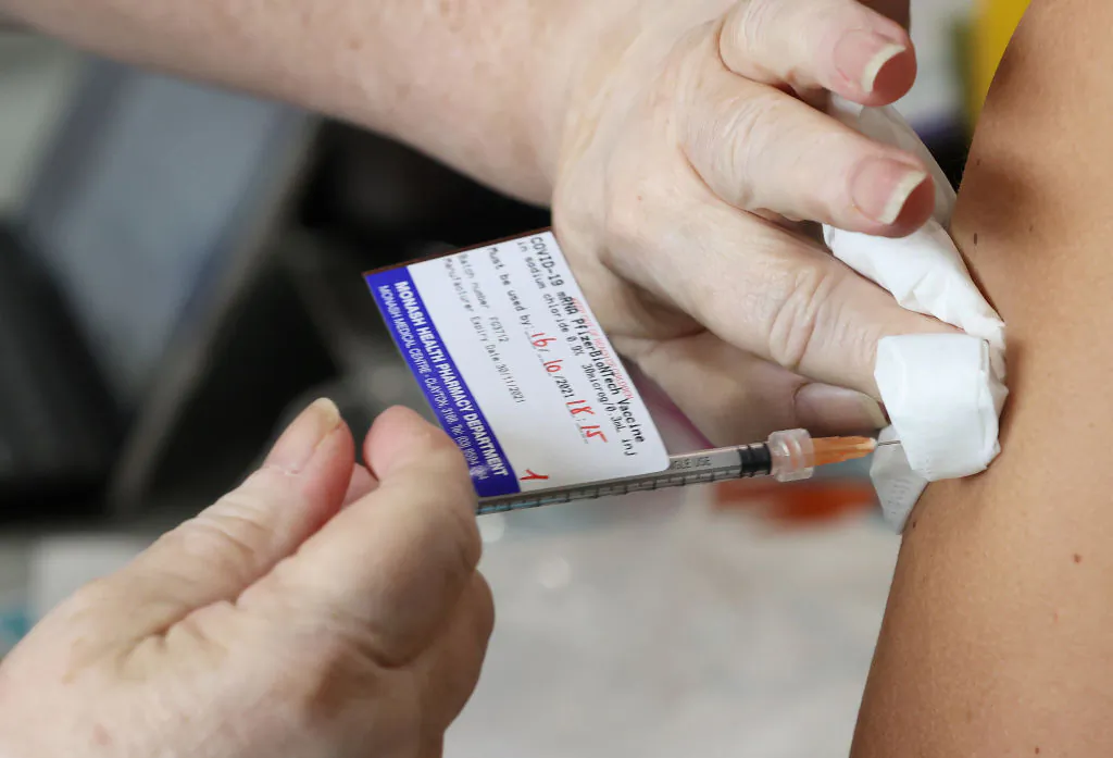 A nurse administers a COVID-19 vaccination at the Casey Fields pop up vaccination clinic in Melbourne, Australia, on Oct. 16, 2021. (Robert Cianflone/Getty Images)