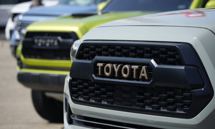 The grille of a 2021 Tacoma pickup truck on display in the Toyota exhibit at the Denver auto show at Elitch’s Gardens in downtown Denver, on Sept. 17, 2021. (David Zalubowski/AP Photo)
