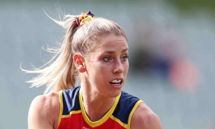 Deni Varnhagen of the Crows runs with the ball during the 2021 AFLW First Preliminary Final match between the Adelaide Crows and the Melbourne Demons at Adelaide Oval, in Adelaide, Australia, on April 10, 2021. (Sarah Reed/AFL Photos via Getty Images)