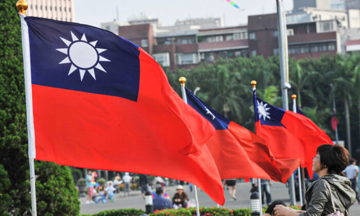 Taiwan's national flags flutter beside Taipei 101 at Sun Yat-sen Memorial Hall in Taipei on Oct. 7, 2012. (Mandy Cheng/AFP via Getty Images)
