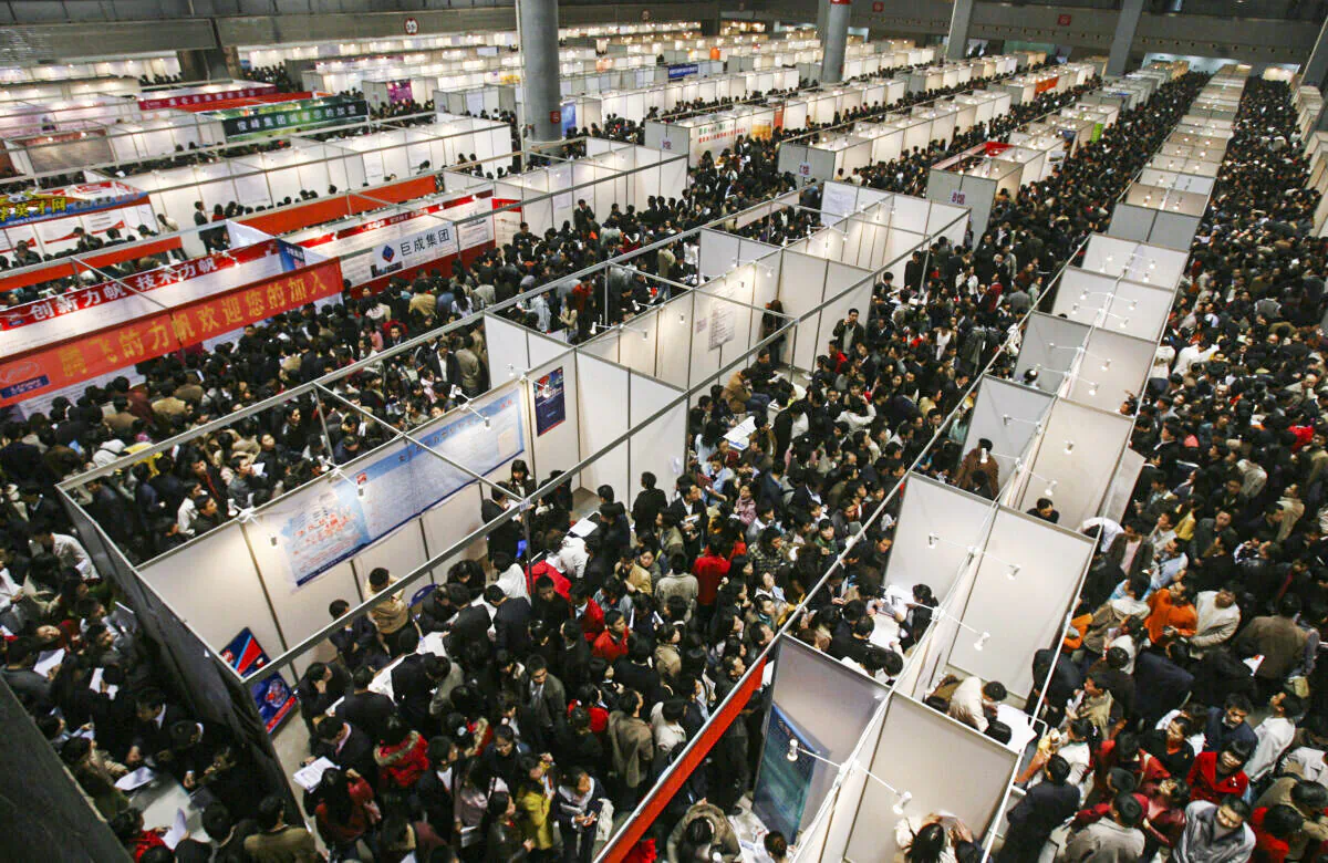 Job hunters pack the Chongqing Springtime Job Fair at Chongqing International Convention and Exhibition Center on Mar. 4, 2007, in Chongqing Municipality, China. (China Photos/Getty Images)