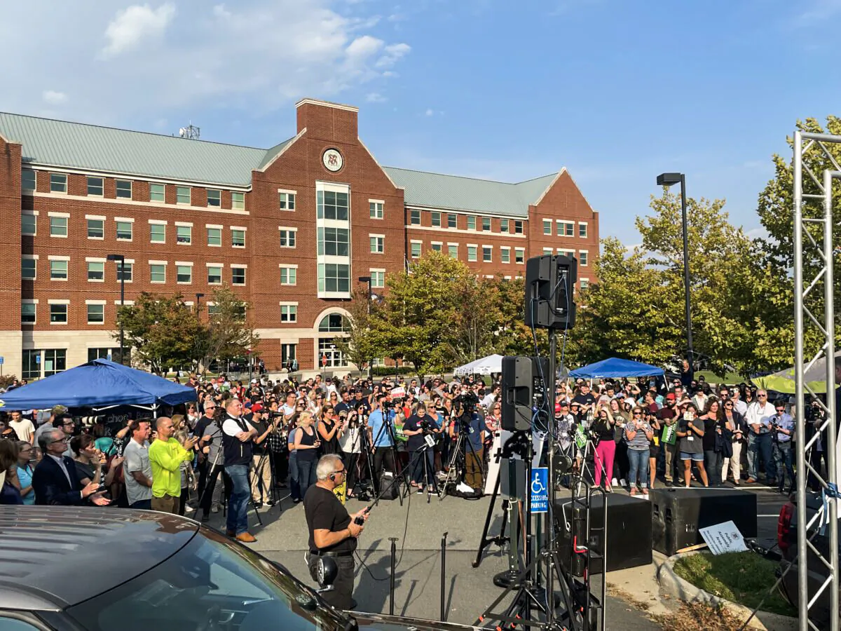 Hundreds protested at a rally outside the Loudoun County Public Schools administration building in Ashburn, Va., on Sept. 28, 2021. (Terri Wu/The Epoch Times)