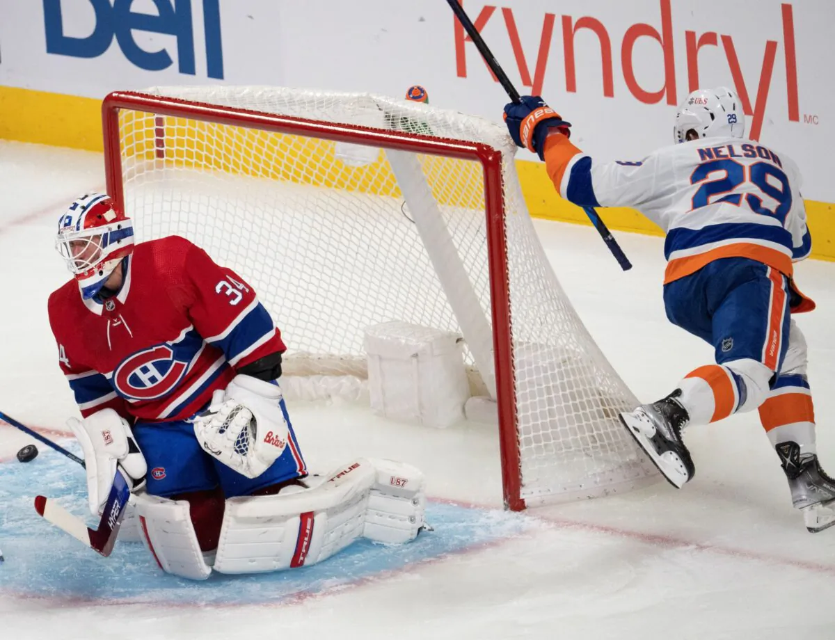 New York Islanders' Brock Nelson (29) scores on Montreal Canadiens goaltender Jake Allen (34) during the first period of an NHL hockey game in Montreal, Canada, on Nov. 4, 2021. (Ryan Remiorz/The Canadian Press via AP)